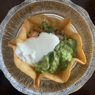 Side of Guac, sour cream, and pico for the Santa Fe chicken salad...