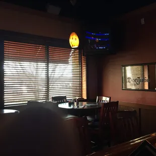 Lots of tvs and window tables