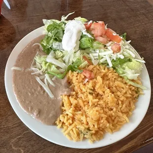 Rice, beans, fajita toppings (lettuce, tomato, sour cream)