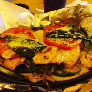 Grilled chicken and shrimp with poblano peppers.