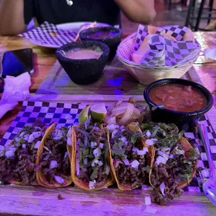 Tacos de asada they were delicious! Green salsa is spicy but I love it. Tacos are fully filled.