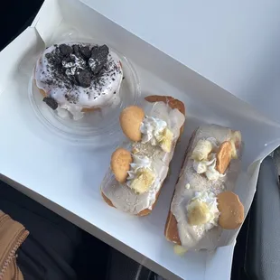 three doughnuts in a box