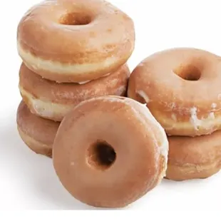 a stack of glazed donuts