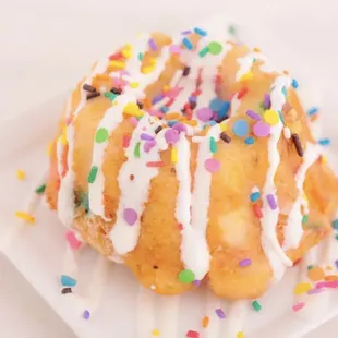 a glazed donut with sprinkles