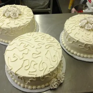 three cakes on a table