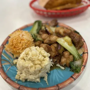 My meal was fantastic! This is ginasan chicken. It comes in beef option too. Red rice and mac salad are tradition!