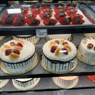 a display of cakes and pastries