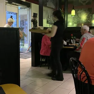 Busy Thursday night large Italian menu with Pizza Good wines fair prices  pasta Peña puttanesca was delicious