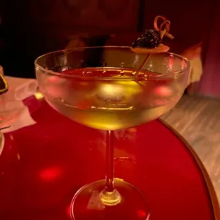 a martini with olives in it