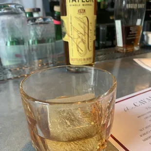 a shot of a glass of whiskey