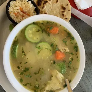Chicken soup with corn Salvadoran tortillas.  Excellent!