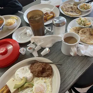 a table full of breakfast foods