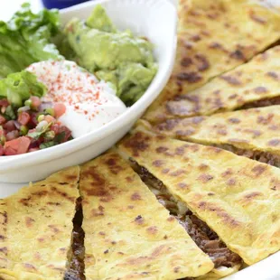 a plate of quesadillas