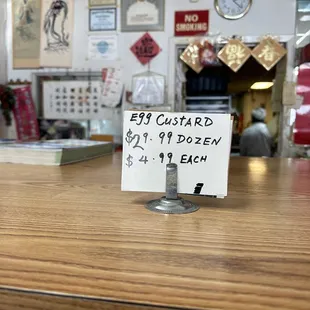 a price sign on a counter