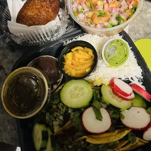 Birria Tacos, black beans with rice, pico de gallo, and Salvadoran plantain
