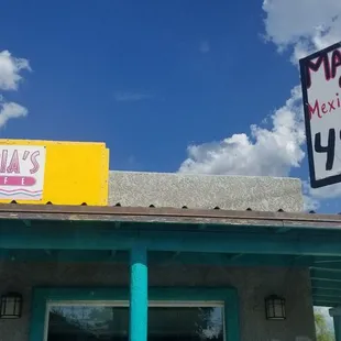 The signs outside Maria's Cafe