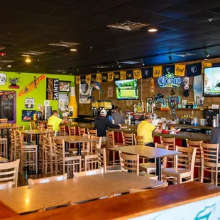 a view of the bar and dining area