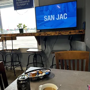 a cup of coffee and a television