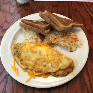 Western omelette with hash browns and wheat toast.