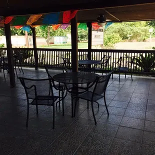 patio with tables and chairs