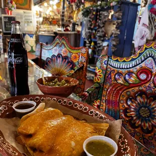 The center of it all: the BEST tamales in town! Your pick of chicken, pork, beef, or jalepeno and cheese.