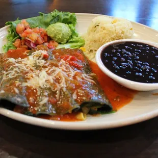 VEGETARIAN enchiladas            
Three blue corn tortillas hand rolled and filled with fresh spinach, yellow squash, zucchini, onions