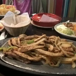 Chicken fajitas in front and my mother's taco salad in the back.