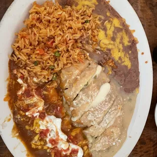 Chile Relleno with a cheese enchilada, rice and beans.