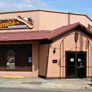 a car parked in front of the restaurant