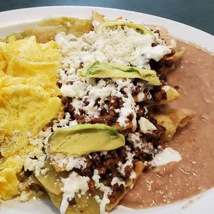 Verde chilaquiles. Added chorizo to eggs but they messed up again and put on chilaquiles.