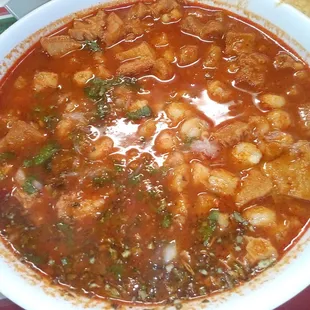 Menudo tripe hominy soup after I put in cilantro onions oregano lemon @ Maria&apos;s San Pedro