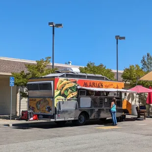 a food truck parked in a parking lot