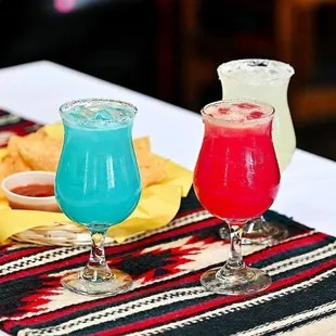 two cocktails on a table