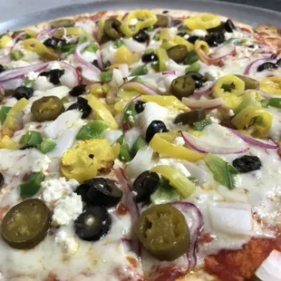 Thin Crust Pizza Topped with your Favorite toppings, What will you Create?