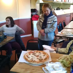 two women and a pizza