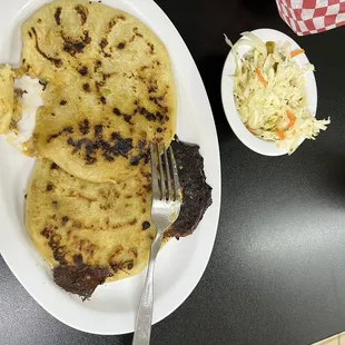 Two pupusas (jalapeño and cheese and traditional)