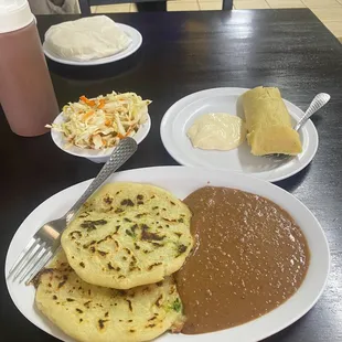 Papusa and beans with corn tamale