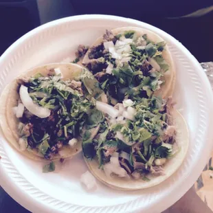 Two asada and one carnitas taco $4.50.... Boom!