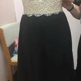 This prom dress was brought to us because it was just a bit too big on top. We got it all fitting perfect for a great prom night.