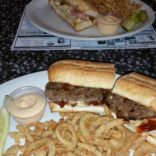 Front, BBQ Bacon Cheeseburger, back Cuban Sandwich - delicious!  Both with haystack onion rings!