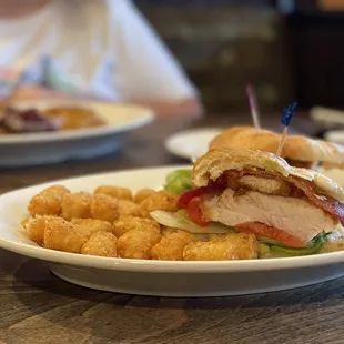 Roasted Turkey Croissant Club with tots