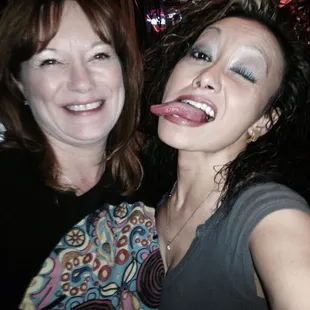 a woman sticking out her tongue