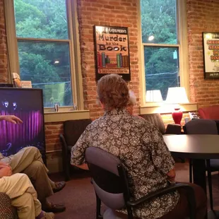 The lobby. And a TV to view the play if you are unable to remaining the theater.