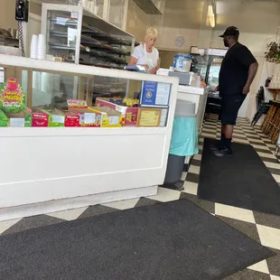 a man standing at the counter