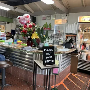 a woman sitting at the counter