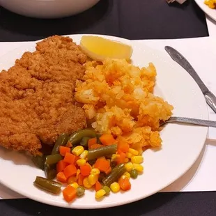 Viener schnitzel and home fries.