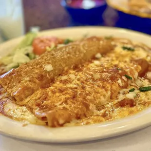 Beef enchilada and cheese enchilada.