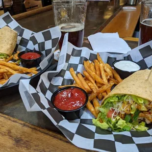 Buffalo chicken wrap cut in 2 servings