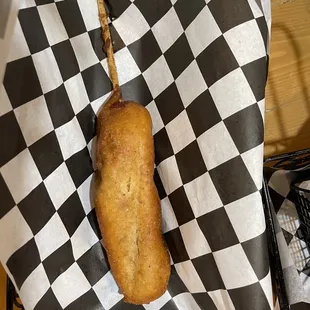 Big ol&apos; juicy hand battered  corndog