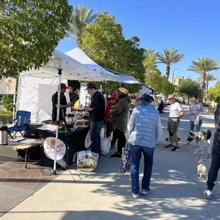 a group of people at a market